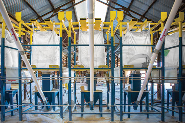 Bulk Bag Weigh Batching Controls Compensate for Terra Cotta Ingredient Variations