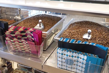 Visible Conveying of Freshly Roasted Beans Creates Unique Customer Experience at Merlo Coffee