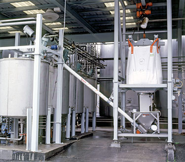 Automated Bulk Bag Unloading, Flexible Conveyor Improve Filtration Effectiveness at Winery