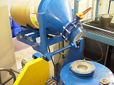 Drum Dump and Conveying System Speeds Hairspray Manufacture