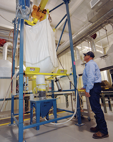 Sealed Bulk Bag Discharge System Contains a Chemical Dust Hazard