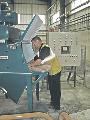 Weigh Batching System Automates Addition of Aluminum Powder to Concrete Block Mixture