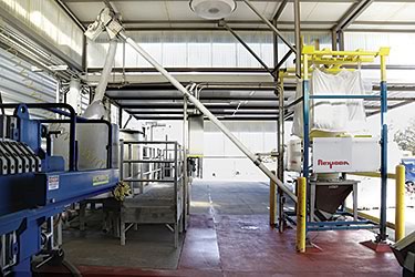 LangeTwins Winery Cuts Labor and Dust of D.E. Filtration with Flexicon  Bulk Bag Weigh Batch Discharger