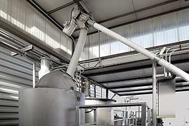 LangeTwins Winery Cuts Labor and Dust of D.E. Filtration with Flexicon  Bulk Bag Weigh Batch Discharger