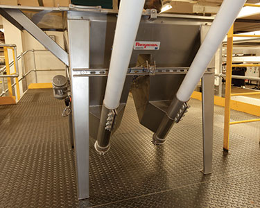 Mechanical and Pneumatic Conveyors Both Prove Best for New "Chocolate Dodger" Process at Burton's Biscuit