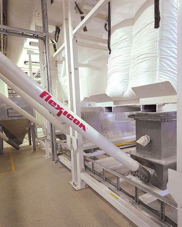 Norwegian Confectionery Maker Improves Safety, Stops Dust, Discharges Bulk Bags Automatically