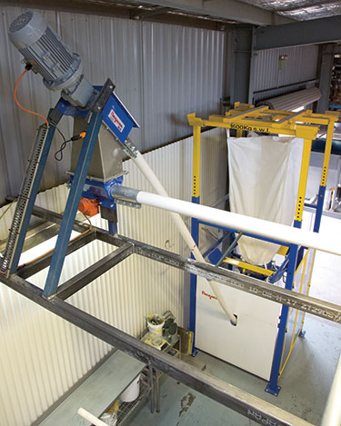 Seed Processor Contains Dust with Bulk Bag Discharger, Flexible Screw Conveyors