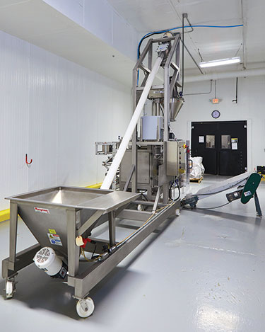 Brittle Pasta Handled Gently, Automatically with Box Dumpers, Tubular Cable Conveyors