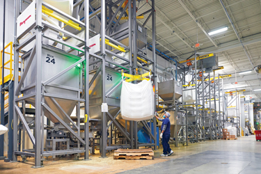 Goya Foods Ups Output with 16 Automated Bulk Bag Dischargers