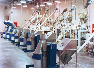 McClancy Seasonings Feeds 8,000 Different Spices and Dry Food Mixes to Packaging Lines with Flexible Screw Conveyor