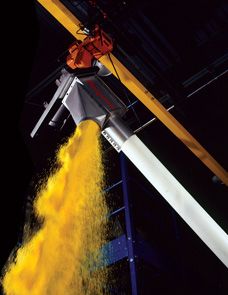 A removable clean-out cap covers the intake end of the conveyor tube, permitting rapid emptying and flushing of the tube, as well as disassembly and wash-down of components.